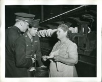 Mill Worker Speaking to Military Men