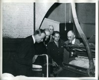 Military and Civilian Officials on Mill Floor