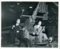 Civilian Men Seated at Anti-Aircraft Gun