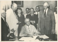 President Roosevelt Signs  Army-Navy “E” production Award Paperwork