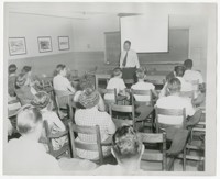Man Speaking in Classroom