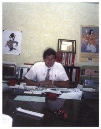 Man Behind Desk